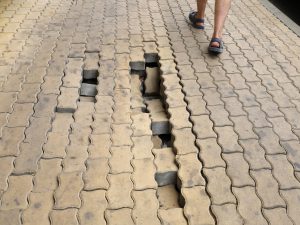 fallen-sidewalk-stones-dangerous-pedestrians